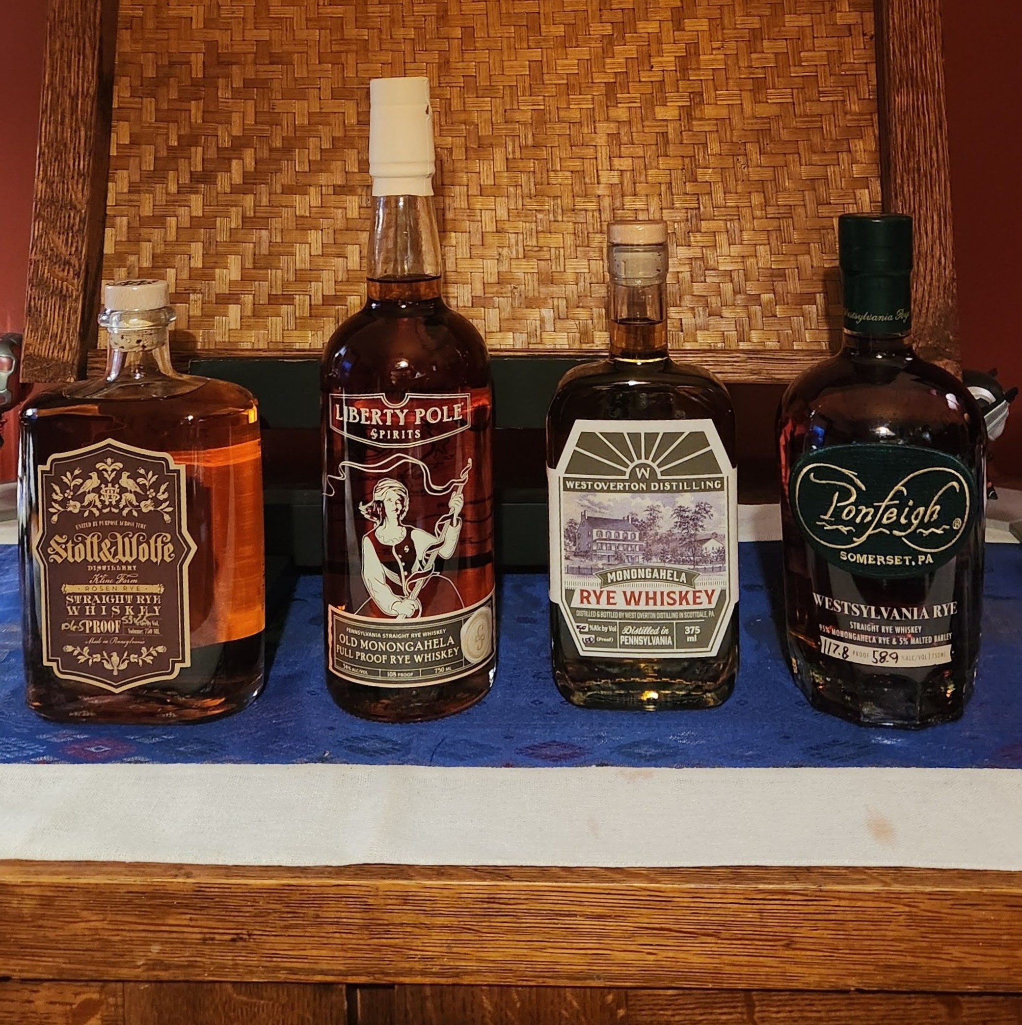 lineup of four rye whiskey bottles