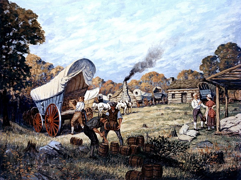 PA farmers loading up barrels of whiskey onto carts